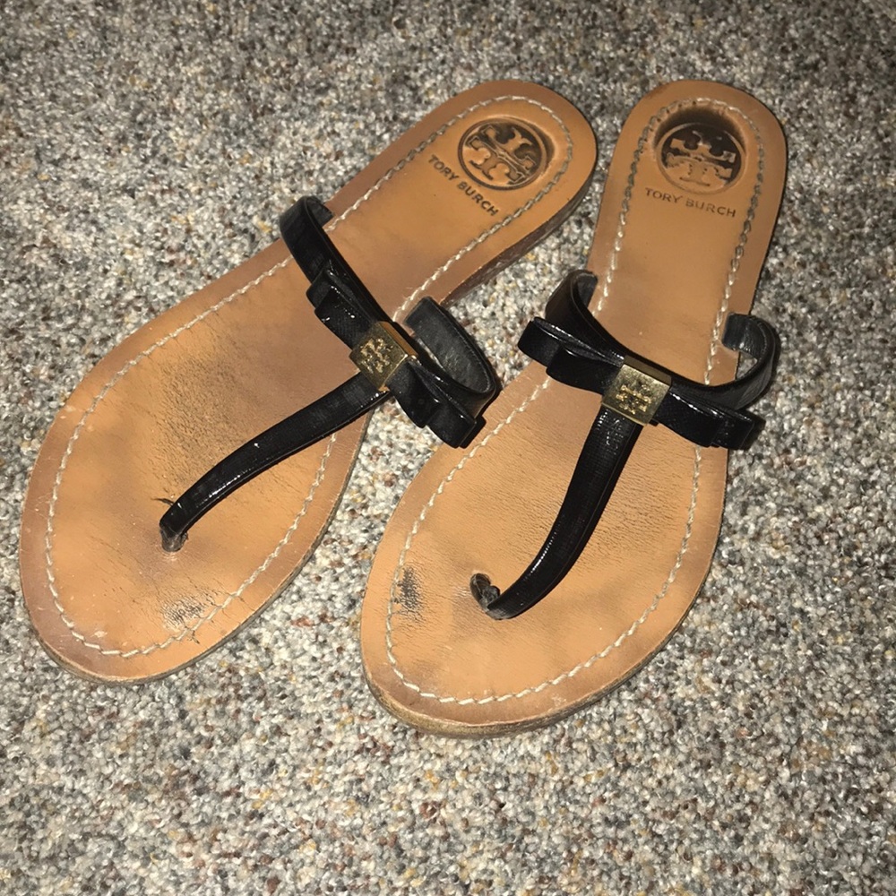 Worn Tory Burch flip flops